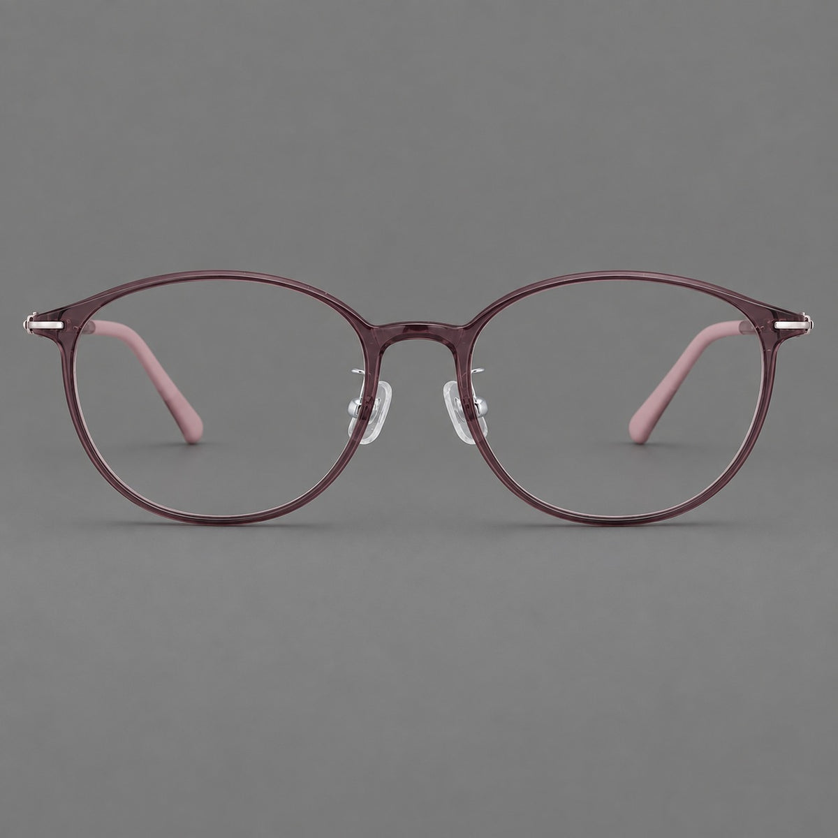 Slim oval plastic eyeglasses with a low profile and subtle metal corner accents in Purple, front view
