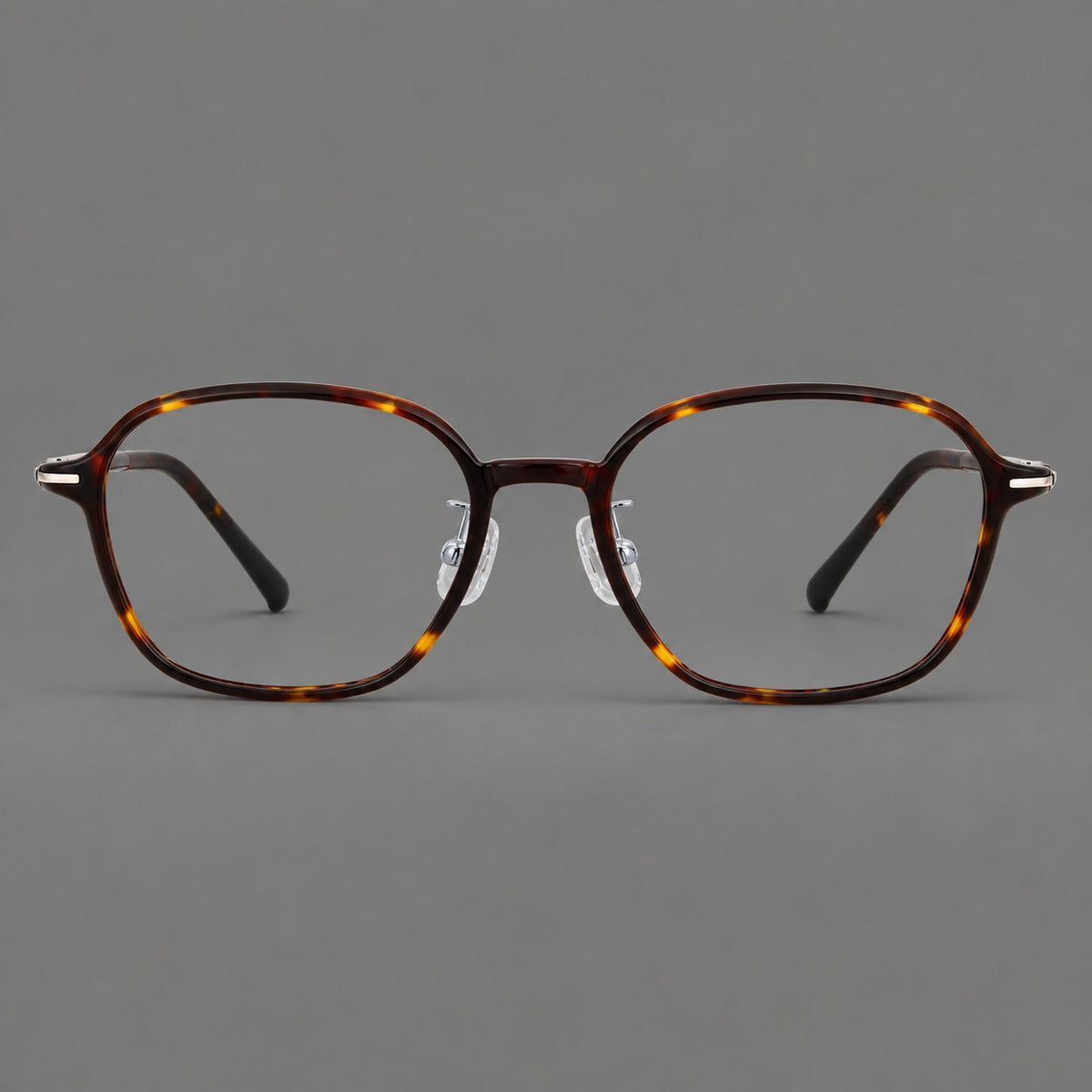 Rounded geometric plastic eyeglasses with softly angled rims and a curved bridge in Tortoiseshell, front view
