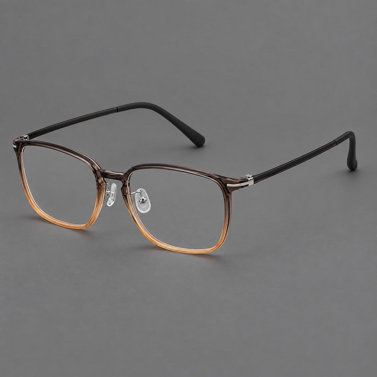 Bold square plastic eyeglasses with a defined browline and an open bridge in Grey Tea Gradient, three quarter view
