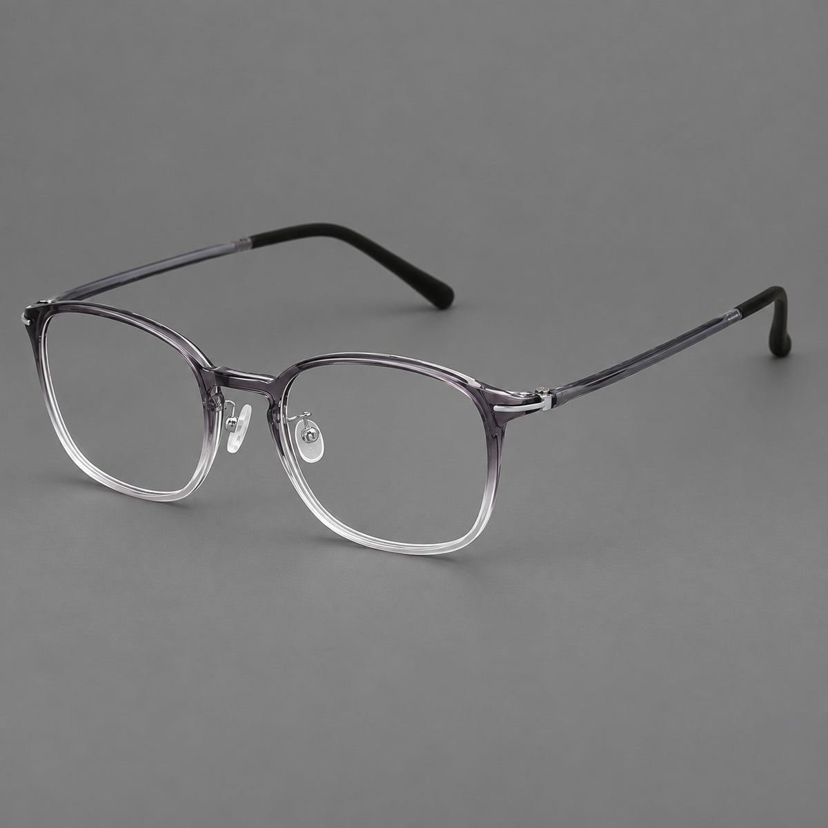 Vintage soft square plastic eyeglasses with deep lenses and a gently arched bridge in Ink Grey Gradient, three quarter view