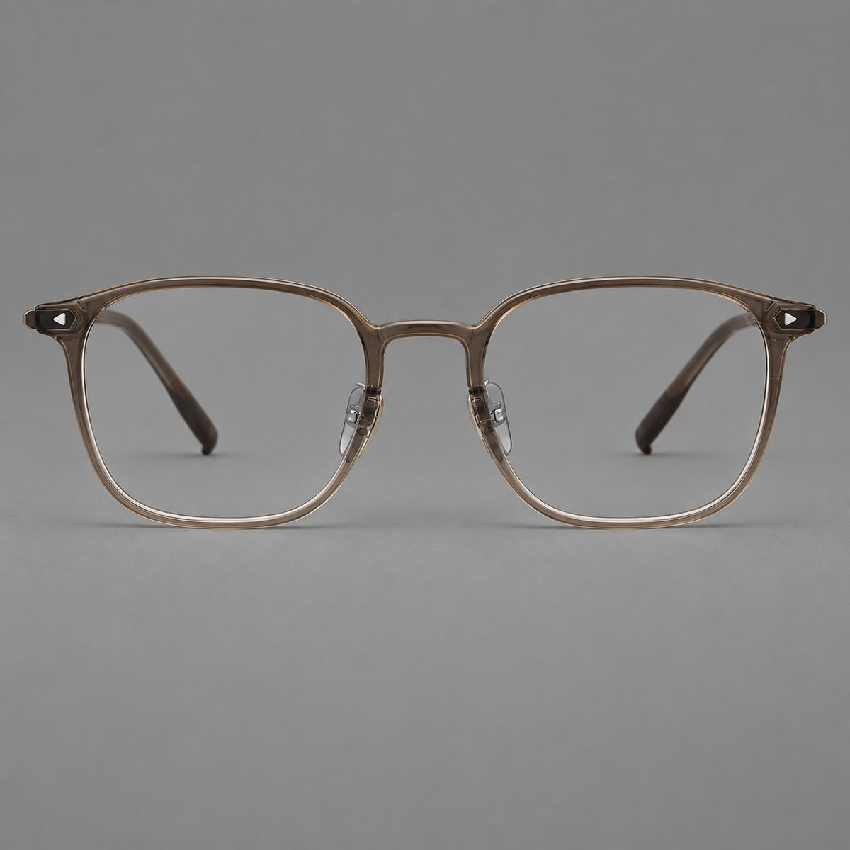 Retro square plastic eyeglasses with a curved bridge and triangular corner details in Brown, front view