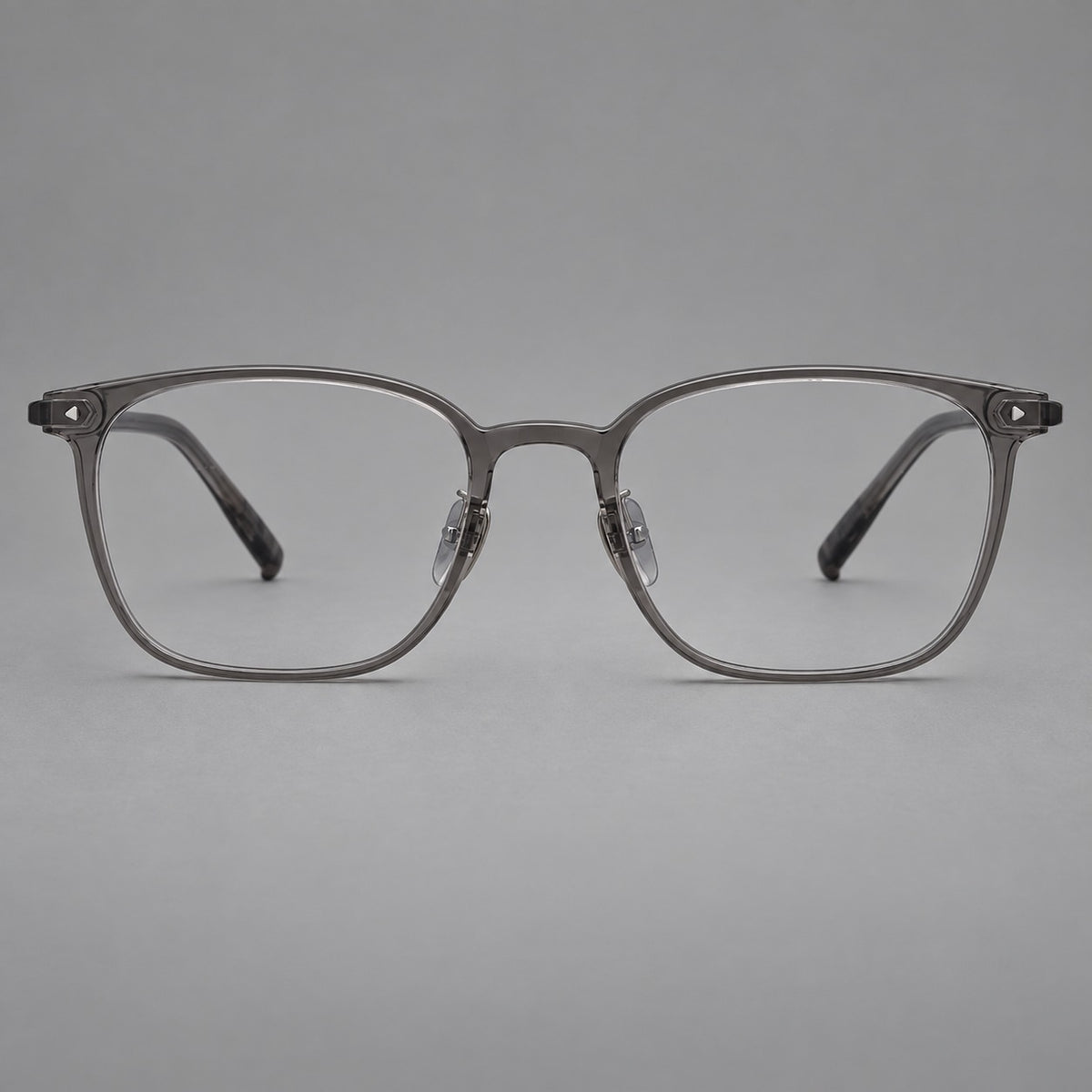 Classic soft square plastic eyeglasses with a gently curved browline and corner studs in Dark Grey, front view