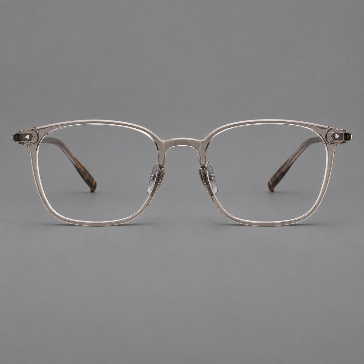 Classic soft square plastic eyeglasses with a gently curved browline and corner studs in Grey Tea, front view