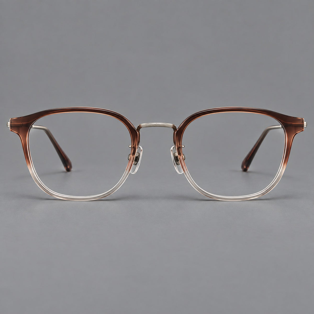Retro soft square eyeglasses in acetate and titanium with a curved bridge and slender temples in Brown Gradient / Light Gunmetal, front view