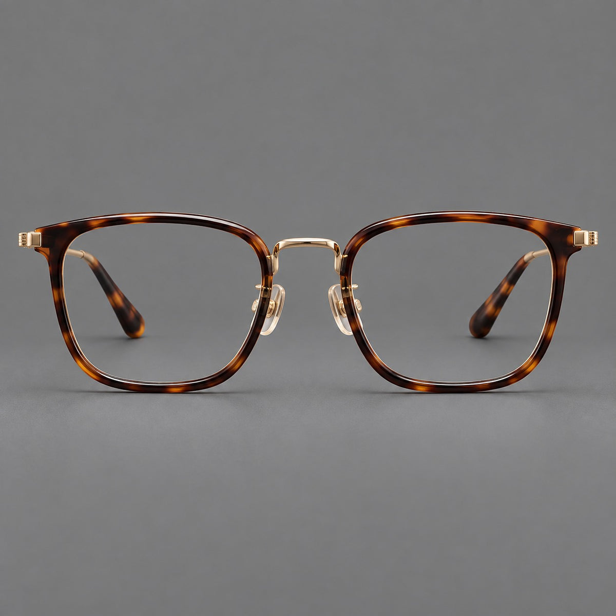 Soft square eyeglasses in acetate and titanium with wide upper corners and fine metal temples in Tortoiseshell / Gold, front view