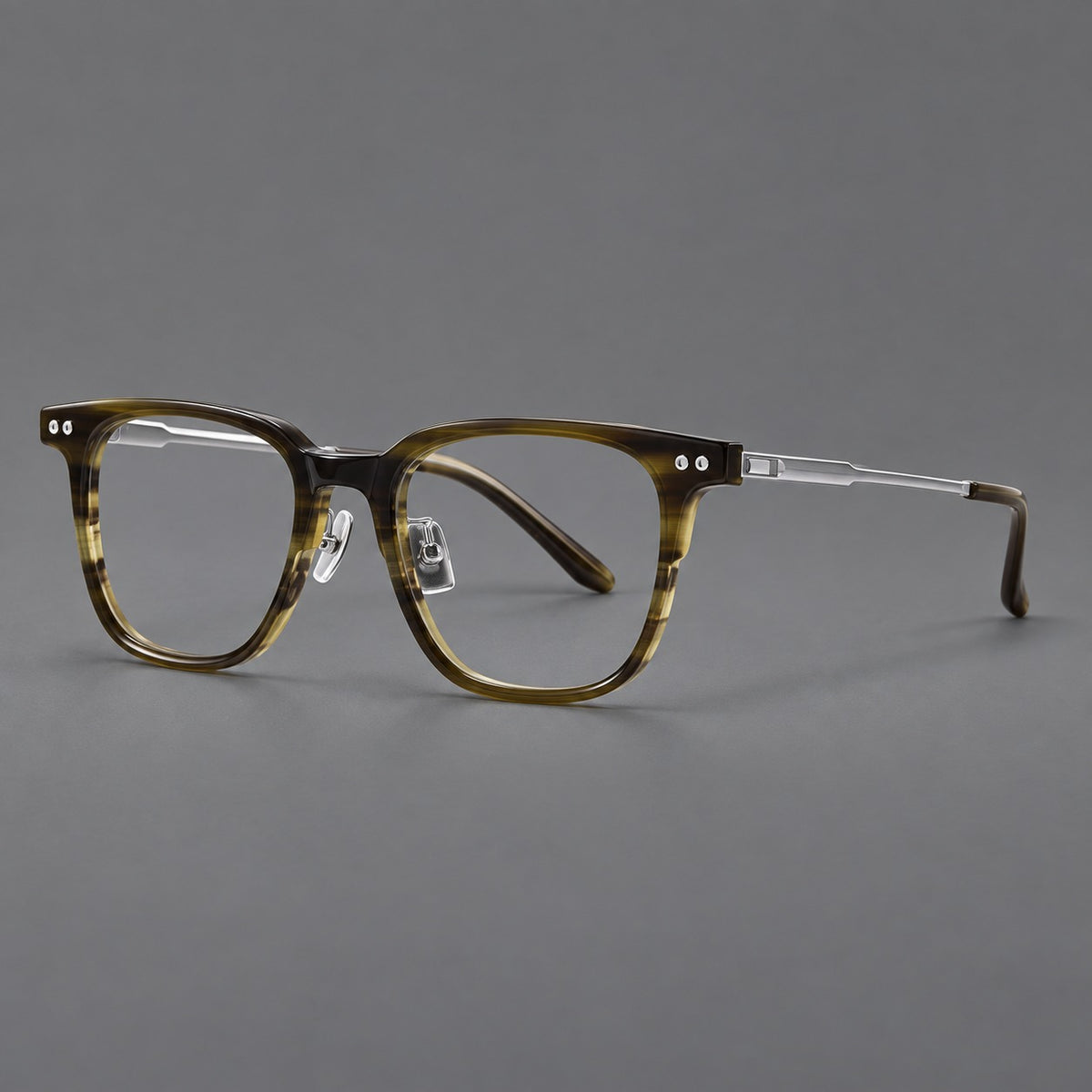 Classic acetate and titanium eyeglasses with squared brows and paired corner rivets in Olive Woodgrain / Silver, three quarter view