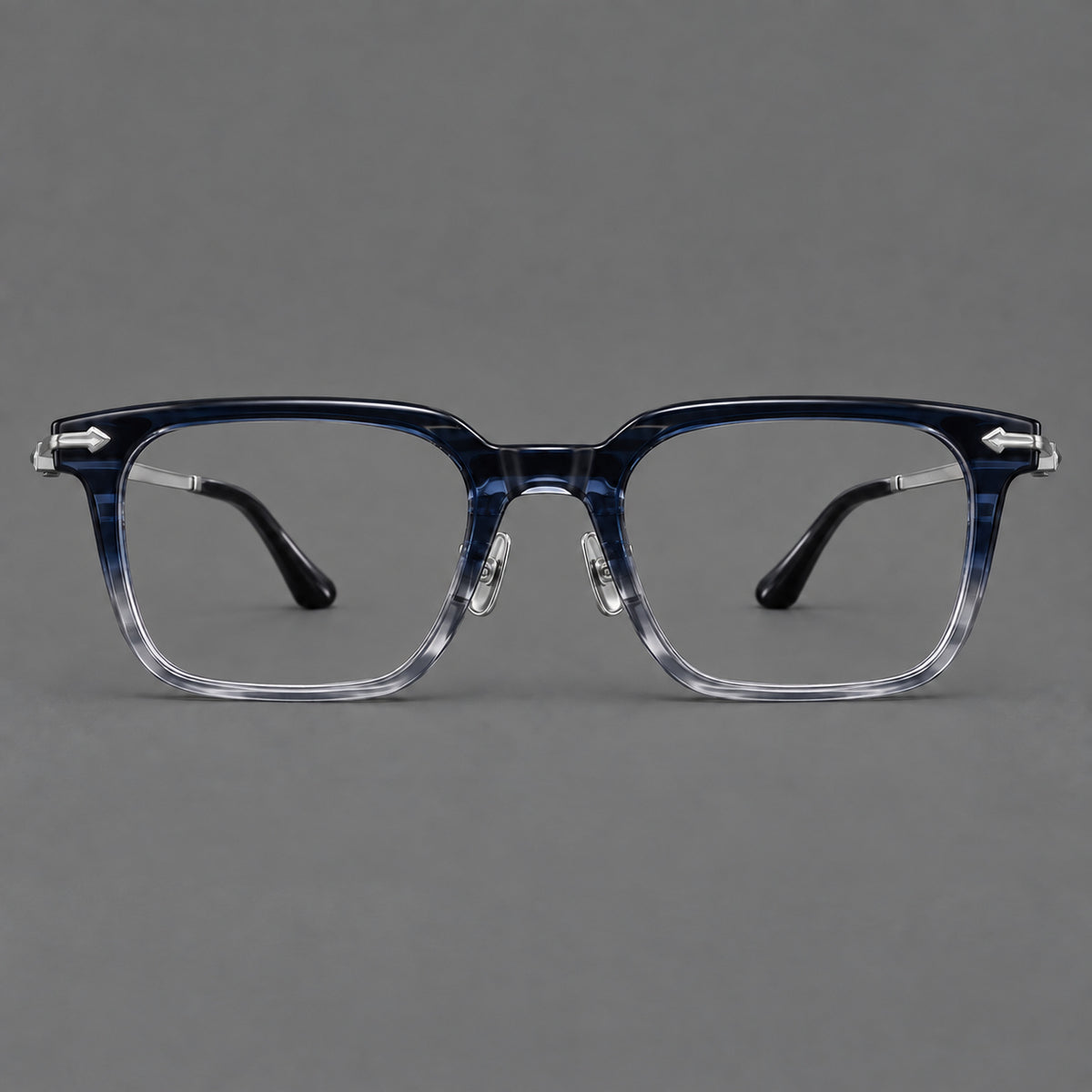 Bold acetate and titanium eyeglasses with rectangular rims and sculpted arrow accents in Blue Gradient / Silver Grey, front view