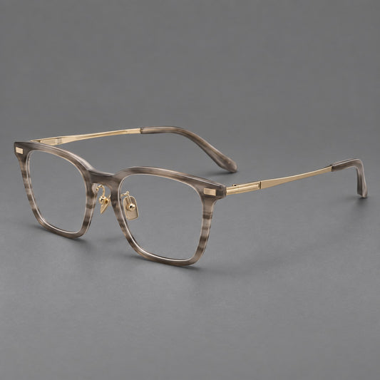 Classic acetate and titanium eyeglasses with rounded square rims and textured corner accents in Grey Woodgrain / Light Gold, three quarter view