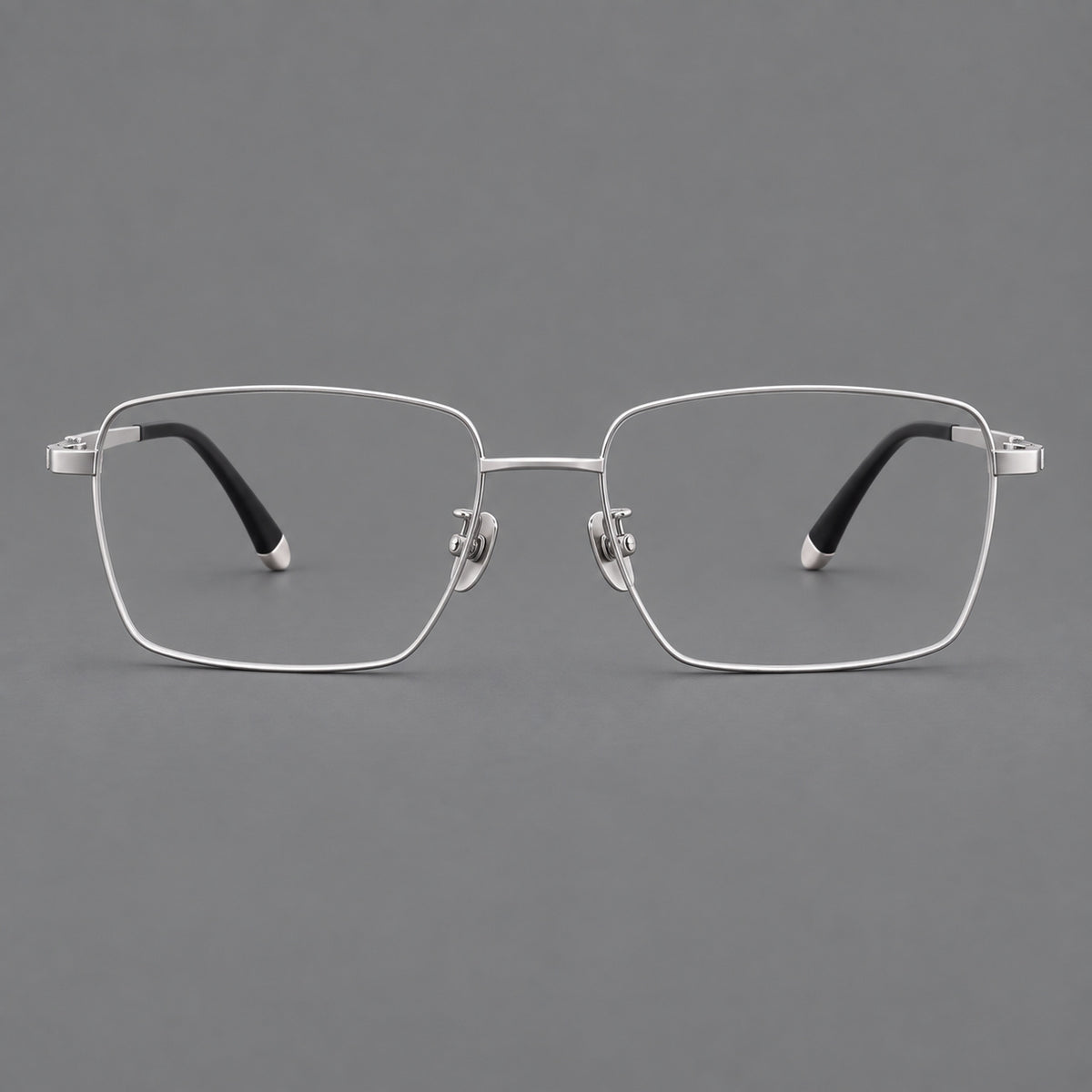 Clean rectangular titanium glasses with inset temple details and pale end accents in Silver, front view