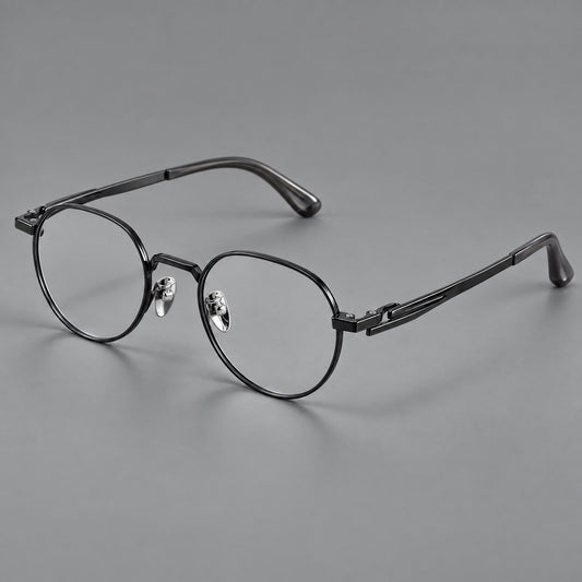 Small panto titanium glasses with an angular bridge and recessed temple details in Black, three quarter view