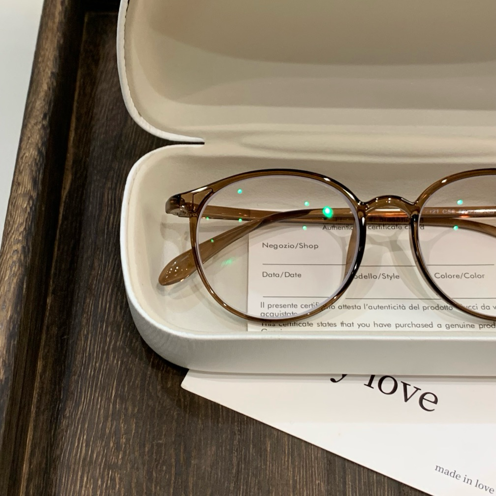 Round Eyeglass Frames with Thin Rims and a Curved Brow, Cool Tea Brown