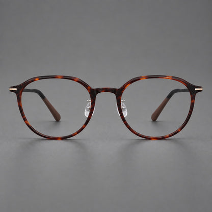Retro round plastic eyeglasses with a curved bridge and slim metal corner accents in Tortoiseshell, front view additional product view