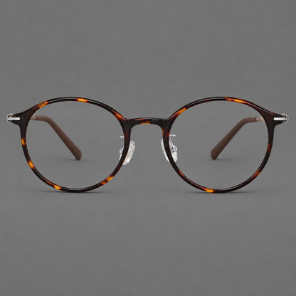 Compact round plastic eyeglasses with gently lifted corners and clear nose pads in Tortoiseshell, front view additional product view