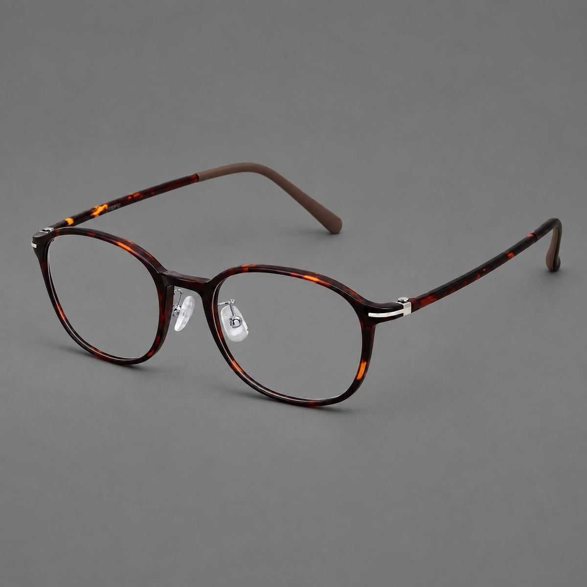 Soft square plastic eyeglasses with a raised browline and rounded lower corners in Tortoiseshell, three quarter view