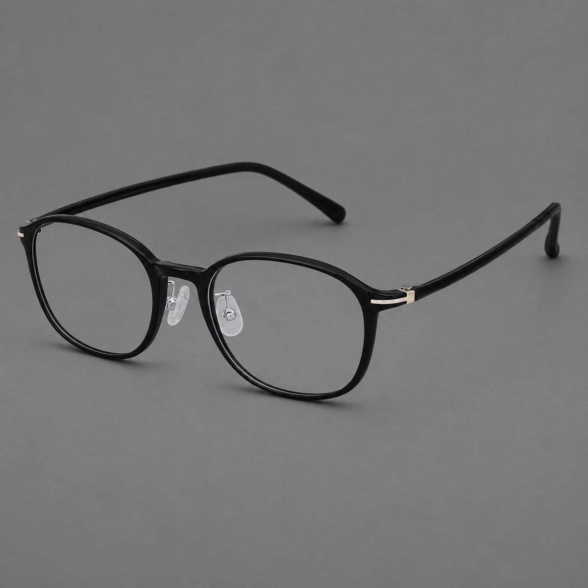 Soft square plastic eyeglasses with a raised browline and rounded lower corners in Glossy Black, three quarter view