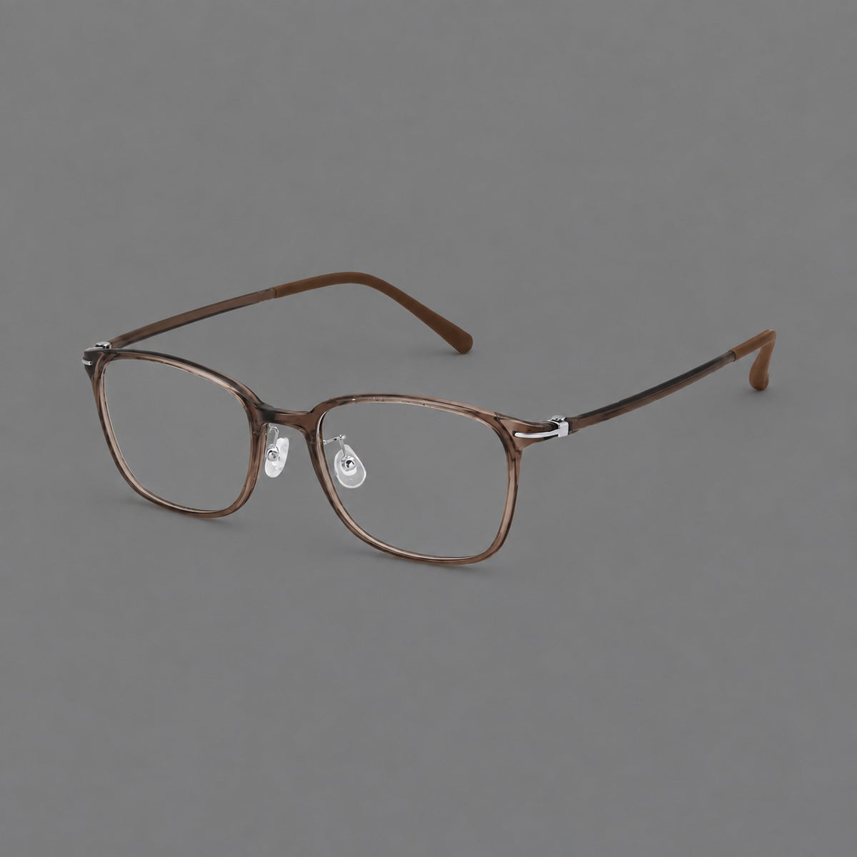 Classic square plastic eyeglasses with broad lenses and softly rounded edges in Ink Brown, three quarter view