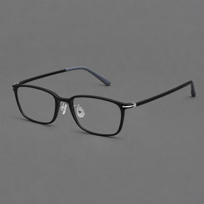 Low profile rectangular plastic eyeglasses with a straight browline and slim temples in Matte Black, three quarter view lens detail