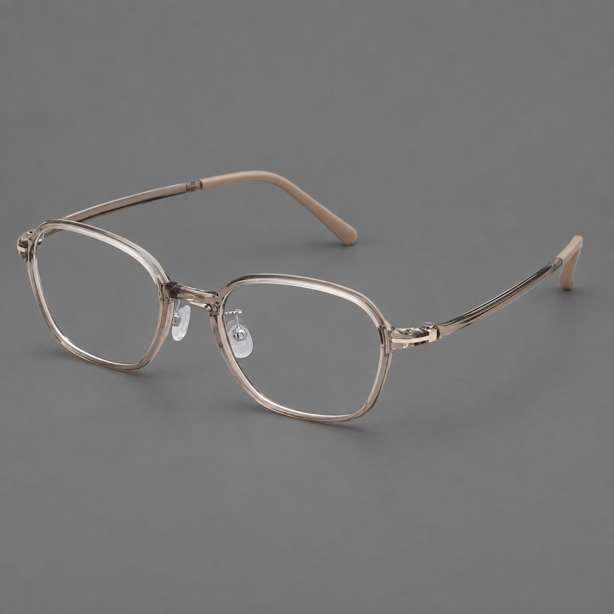 Rounded geometric plastic eyeglasses with softly angled rims and a curved bridge in Twilight Grey Tea, three quarter view