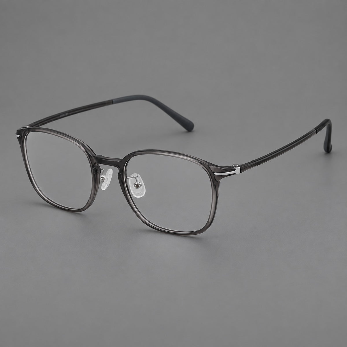 Vintage soft square plastic eyeglasses with deep lenses and a gently arched bridge in Dark Grey, three quarter view