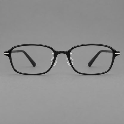 Soft oval plastic eyeglasses with a narrow bridge and gently rounded outer corners in Glossy Black, front view side view