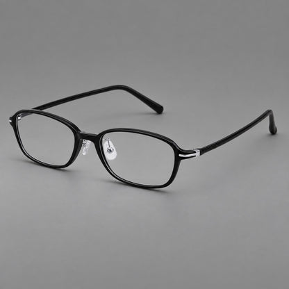 Soft oval plastic eyeglasses with a narrow bridge and gently rounded outer corners in Glossy Black, three quarter view