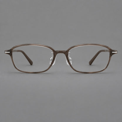 Soft oval plastic eyeglasses with a narrow bridge and gently rounded outer corners in Ink Brown, front view temple detail