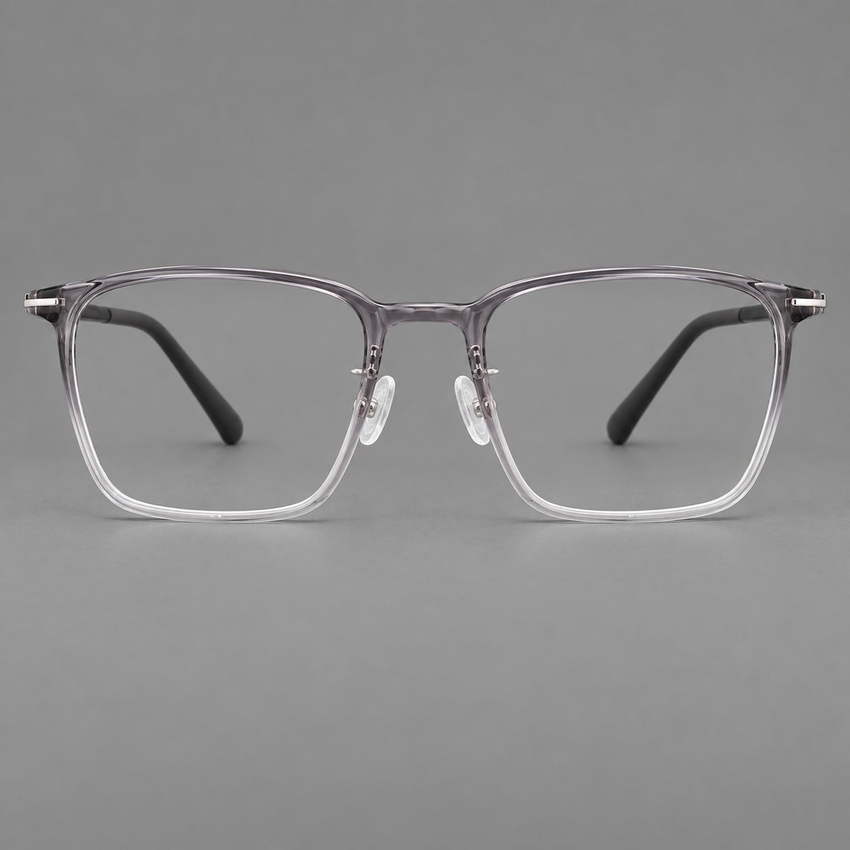 Modern square plastic eyeglasses with a smooth browline and slim metal corner details in Ink Grey Gradient, front view