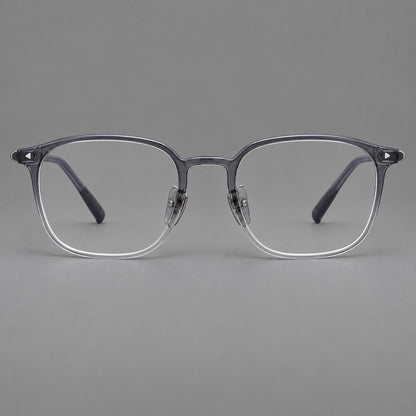 Retro square plastic eyeglasses with a curved bridge and triangular corner details in Ink Grey, front view frame detail