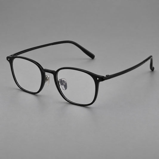 Retro square plastic eyeglasses with a curved bridge and triangular corner details in Glossy Black, three quarter view