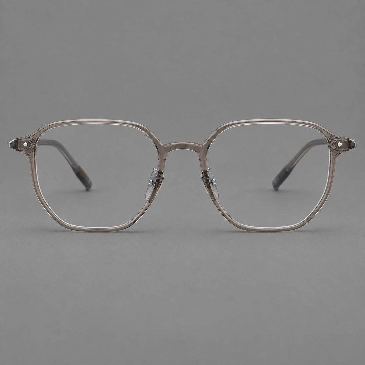 Soft square plastic eyeglasses with rounded lower rims and a broad curved bridge in Grey Brown, front view