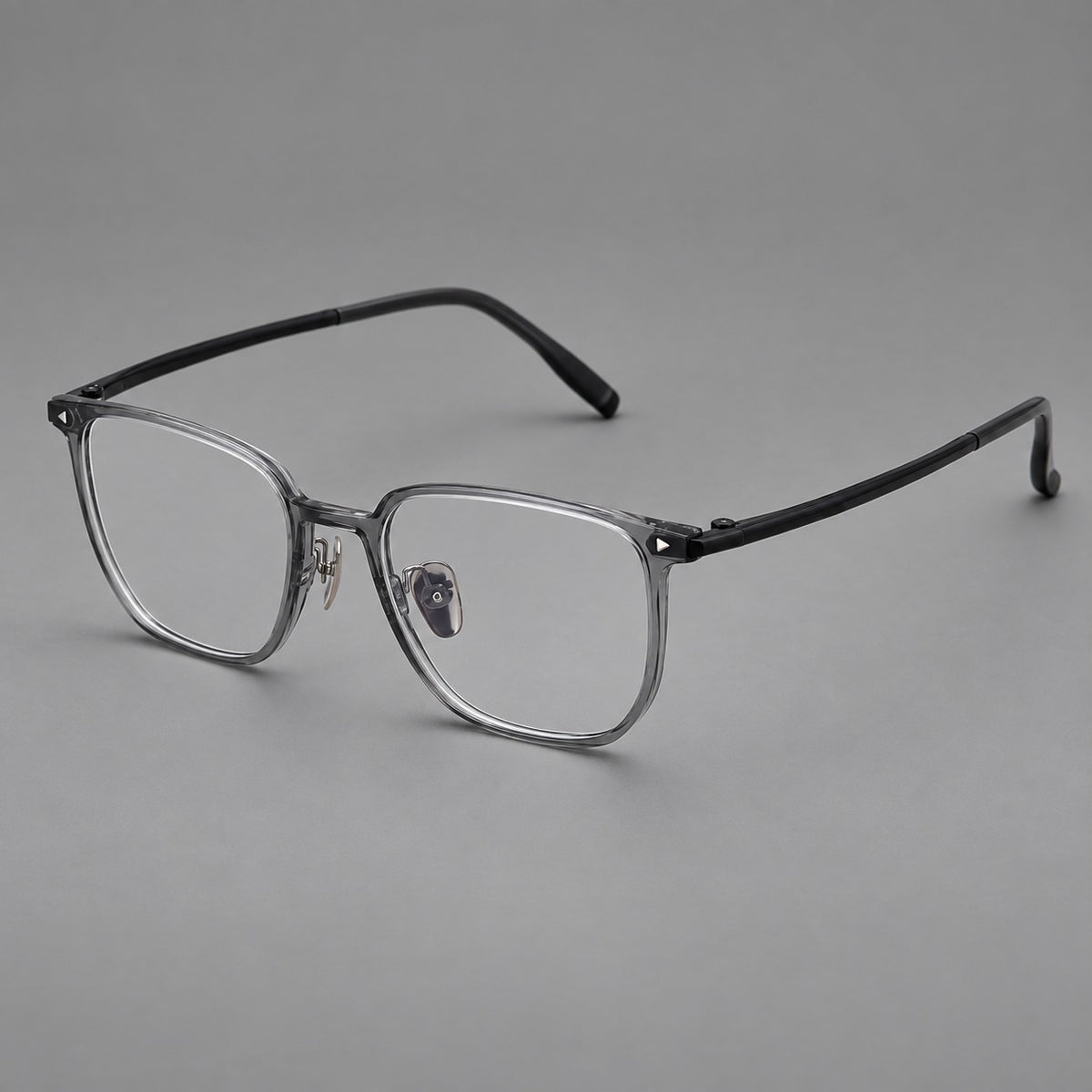 Refined rectangular plastic eyeglasses with raised outer corners and clear nose pads in Medium Grey, three quarter view