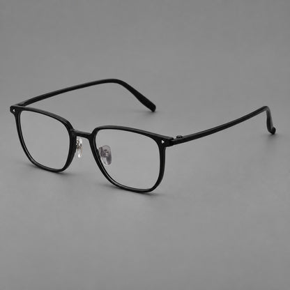 Refined rectangular plastic eyeglasses with raised outer corners and clear nose pads in Glossy Black, three quarter view