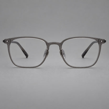 Classic soft square plastic eyeglasses with a gently curved browline and corner studs in Dark Grey, front view frame detail