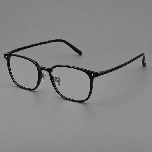 Classic soft square plastic eyeglasses with a gently curved browline and corner studs in Glossy Black, three quarter view