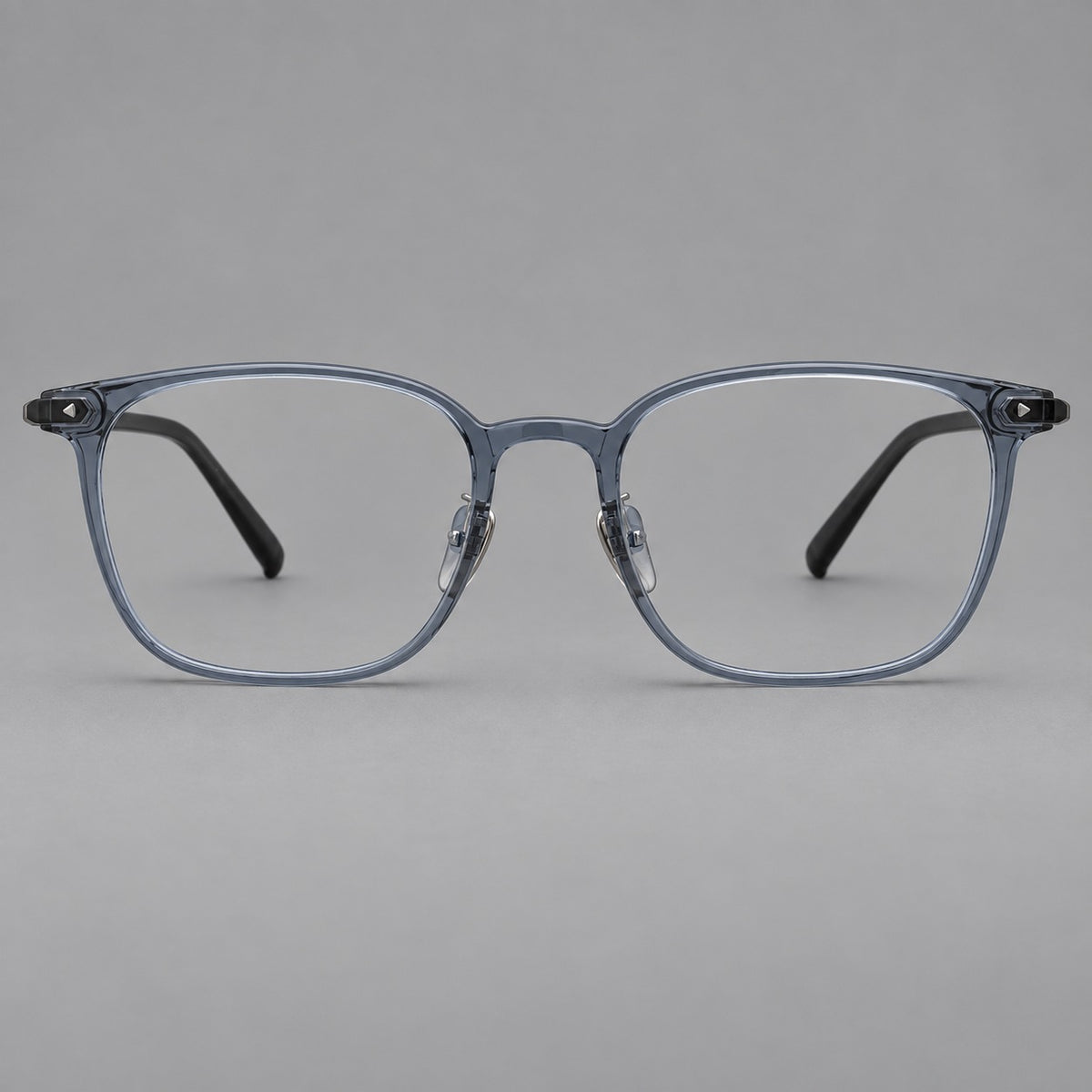 Classic soft square plastic eyeglasses with a gently curved browline and corner studs in Slate Blue, front view