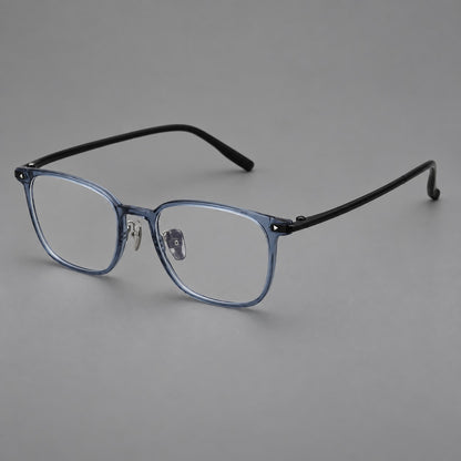 Classic soft square plastic eyeglasses with a gently curved browline and corner studs in Slate Blue, three quarter view additional product view