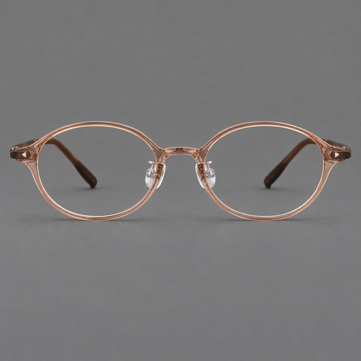 Retro round plastic eyeglasses with softly lifted corners and a sculpted bridge in Tea, front view
