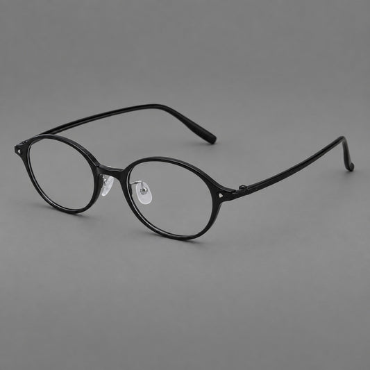 Retro round plastic eyeglasses with softly lifted corners and a sculpted bridge in Glossy Black, three quarter view