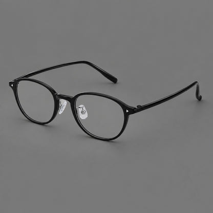 Panto plastic eyeglasses with a rounded silhouette and triangular corner studs in Glossy Black, three quarter view