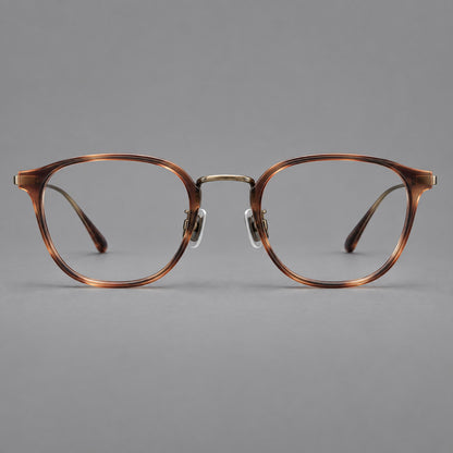Retro soft square eyeglasses in acetate and titanium with a curved bridge and slender temples in Amber Tortoiseshell / Antique Gold, front view side view