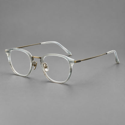 Retro soft square eyeglasses in acetate and titanium with a curved bridge and slender temples in Ice Grey Tortoiseshell / Antique Gold, three quarter view front view