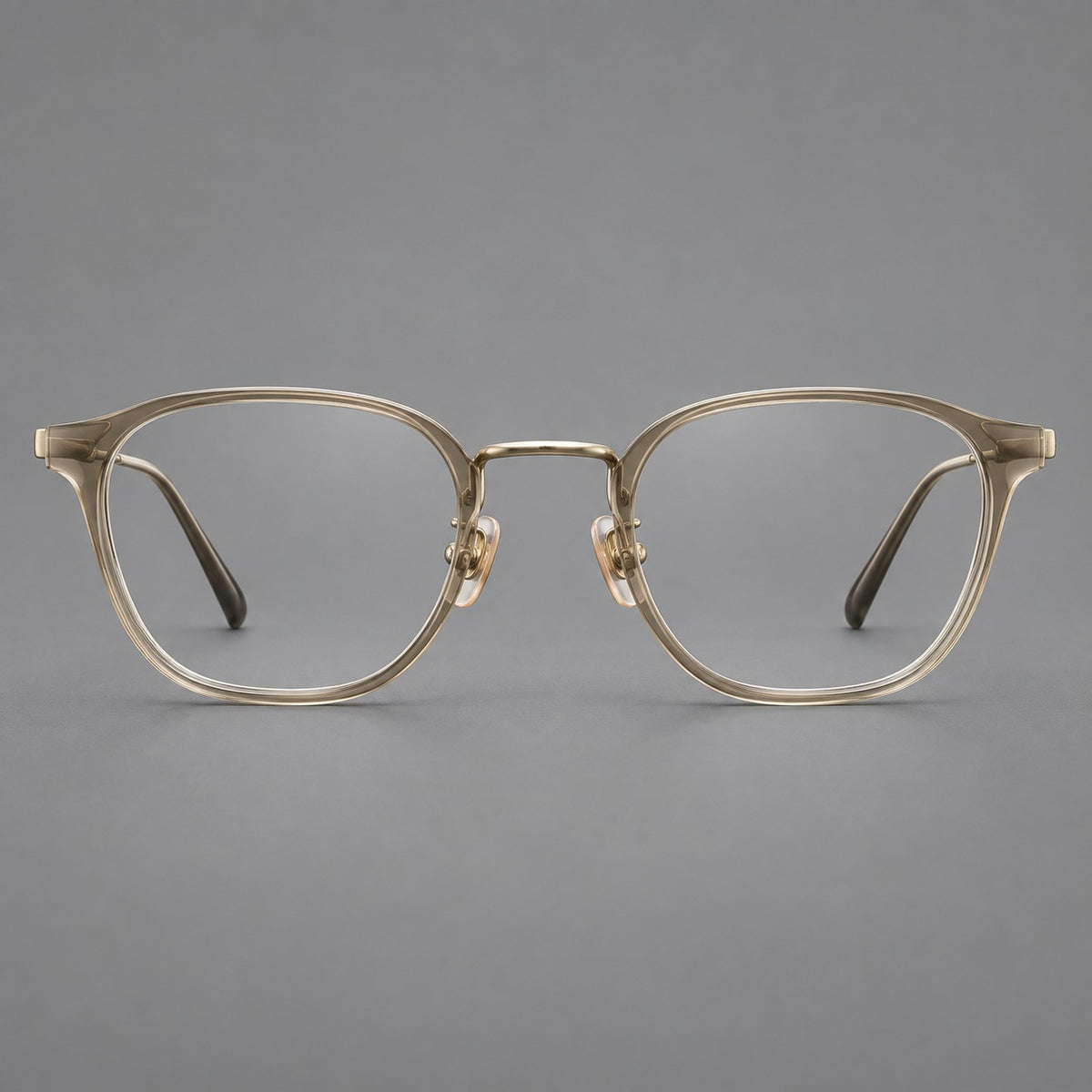 Retro soft square eyeglasses in acetate and titanium with a curved bridge and slender temples in Tea Gradient / Light Gold, front view