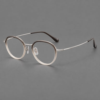 Rounded eyeglasses in acetate and titanium with gently arched brows and engraved metal temples in Mist Grey Gradient / Silver, three quarter view front view
