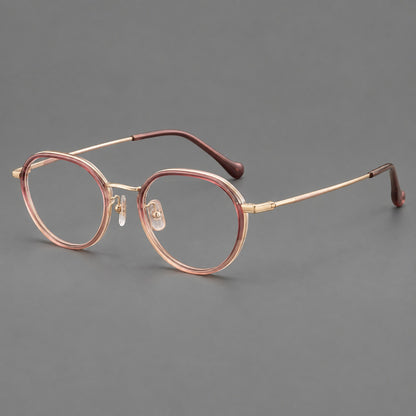 Rounded eyeglasses in acetate and titanium with gently arched brows and engraved metal temples in Pink Tea Gradient / Rose Gold, three quarter view lens detail