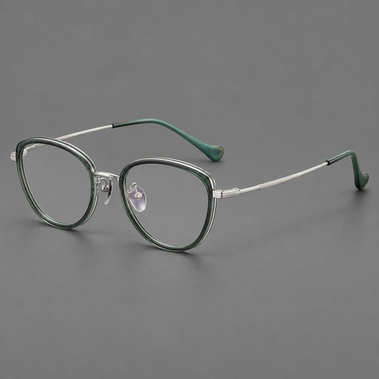 Upswept eyeglasses in acetate and titanium with softly rounded rims and tapered metal temples in Clear Green / Silver, three quarter view