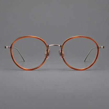 Classic round eyeglasses in acetate and titanium with slim rims and textured metal temples in Tea Brown / Gunmetal, front view side view