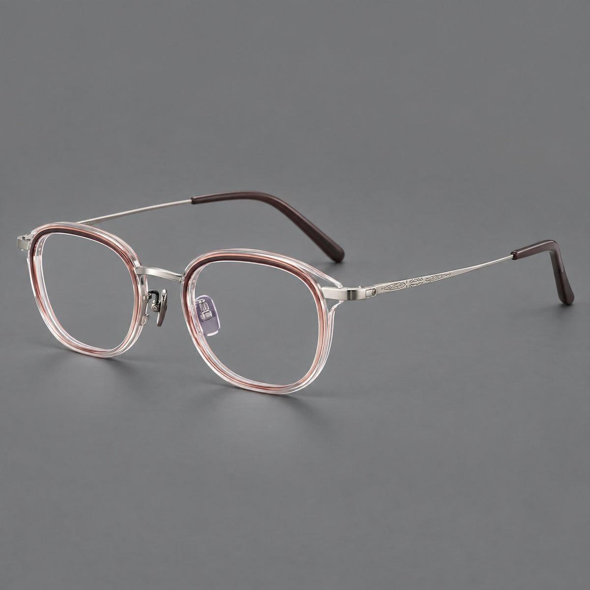 Soft square eyeglasses in acetate and titanium with rounded corners and decorative metal temples in Clear Tea Gradient / Silver, three quarter view