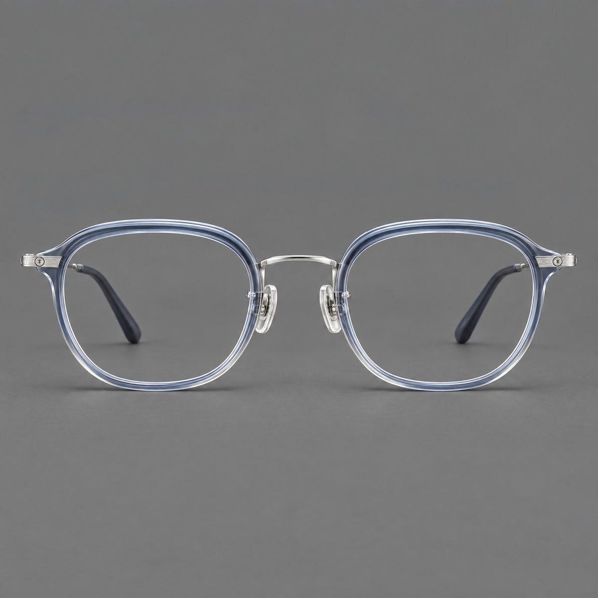 Soft square eyeglasses in acetate and titanium with rounded corners and decorative metal temples in Grey Blue Gradient / Silver, front view