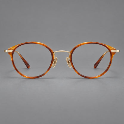 Retro panto eyeglasses in acetate and titanium with an arched bridge and engraved metal temples in Amber Tortoiseshell / Light Gold, front view side view