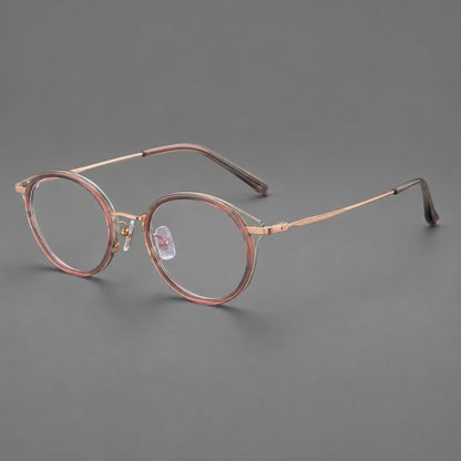 Retro panto eyeglasses in acetate and titanium with an arched bridge and engraved metal temples in Patterned Pink / Rose Gold, three quarter view front view